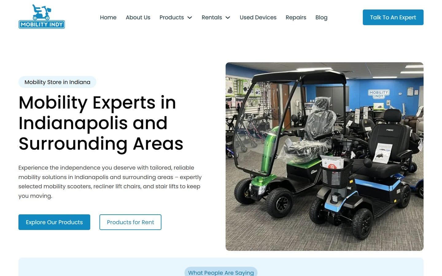 Mobility Indy home page on a desktop screen, headline Mobility Experts in Indianapolis and Surrounding Areas, with a showroom photo of scooters
